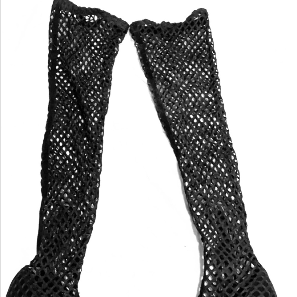 Fishnet thigh high boots with jeweled heel